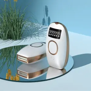 Two handheld IPL (Intense Pulsed Light) hair removal devices with digital displays, placed on a reflective surface against a blue background with decorative plants and shadows of palm trees.